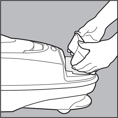 Lift hood and remove.