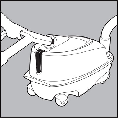 To unclog hose put handle in suction port.