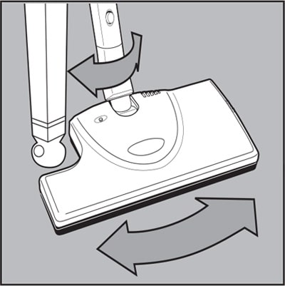 Steer the Power Brush extension around chair or table legs.